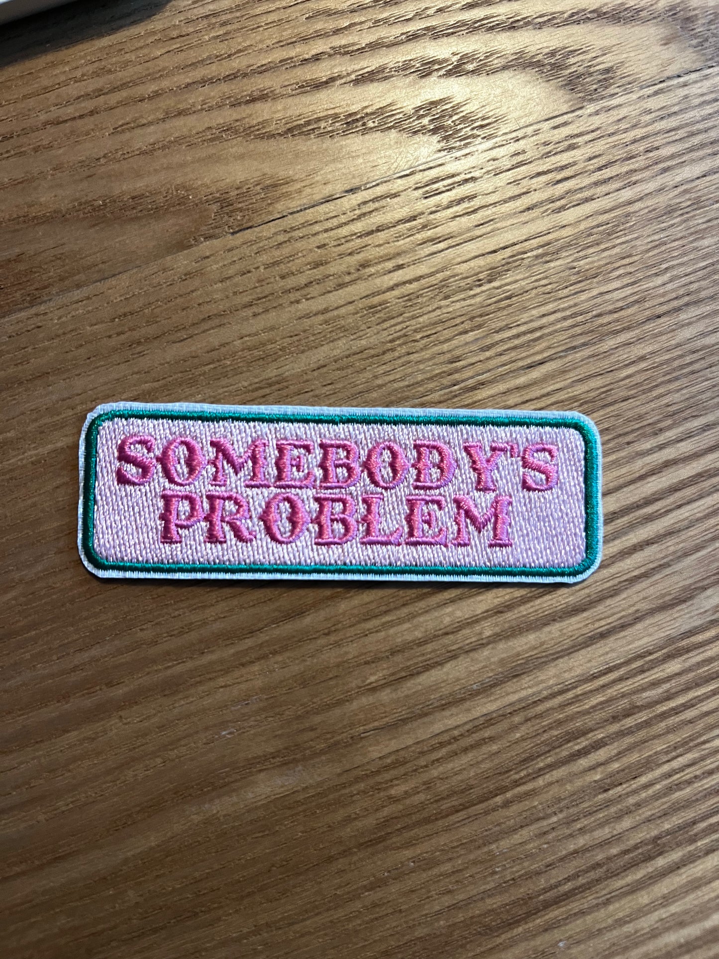 Somebody's problem (niet ware grootte)